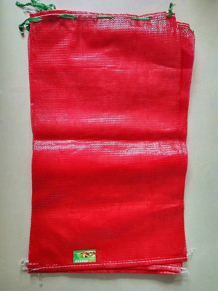 circular mesh bag with label